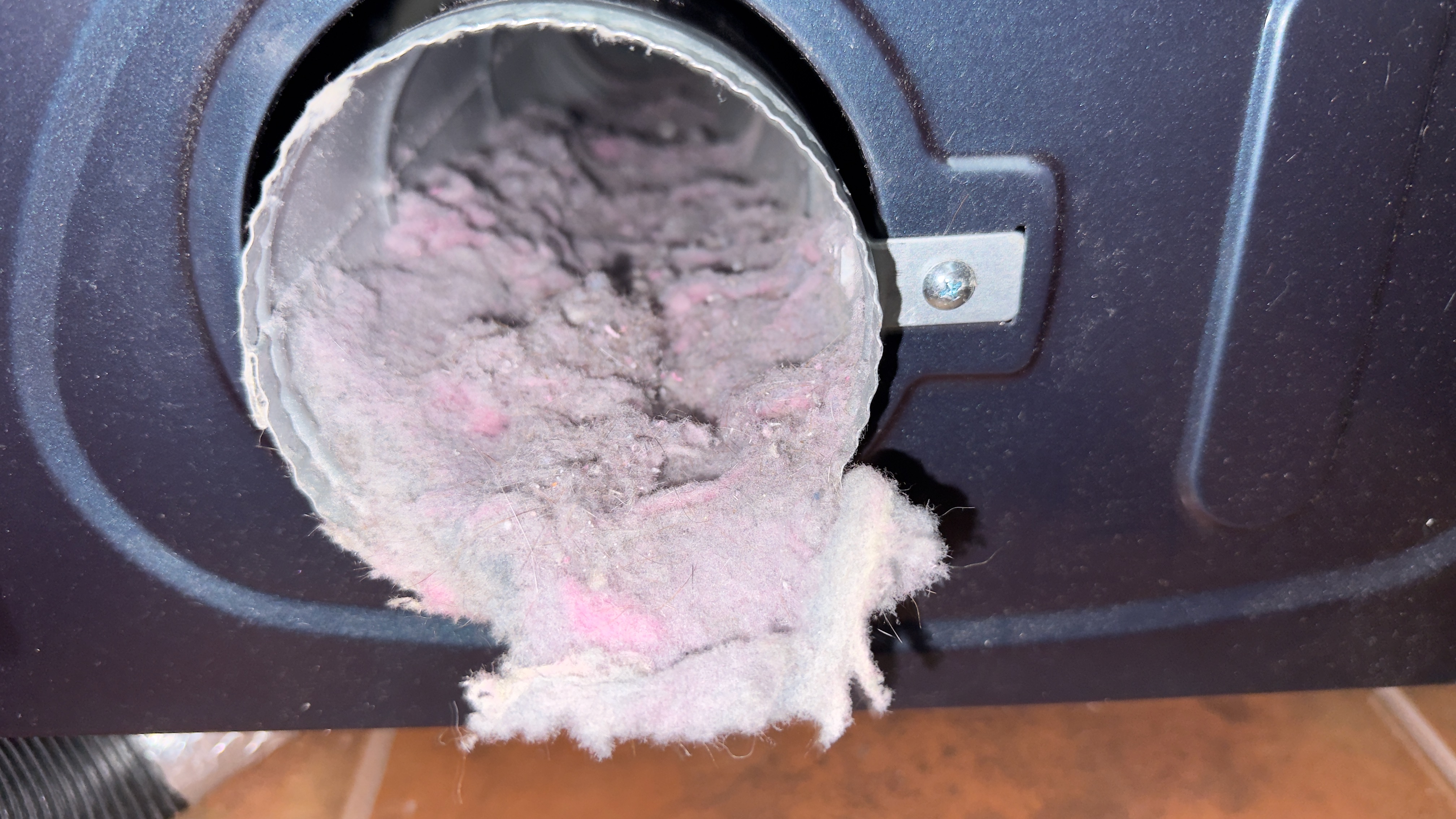 Dryer outlet packed with lint before cleaning in Woodbridge VA